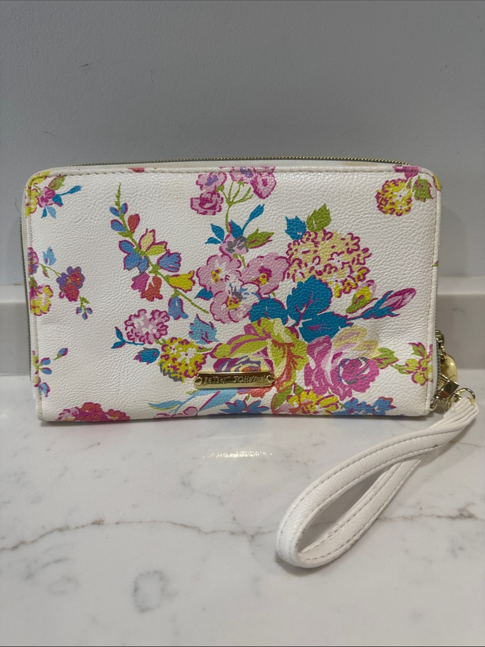 Betsey Johnson White Floral Wristlet with Pink, Blue, Yellow and Green Accents